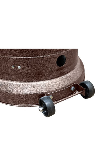 Close-up of a brown metal object with wheels on a white background