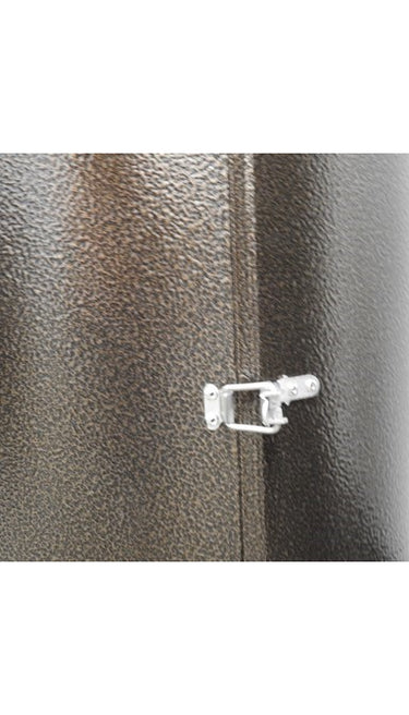 Close-up of a metallic lock on a textured surface